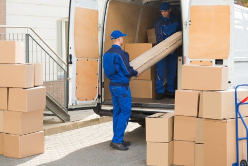 Removal van moving boxes and furniture in Brent