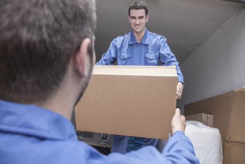 Person reviewing cookie settings on a laptop for Removal Van Brent