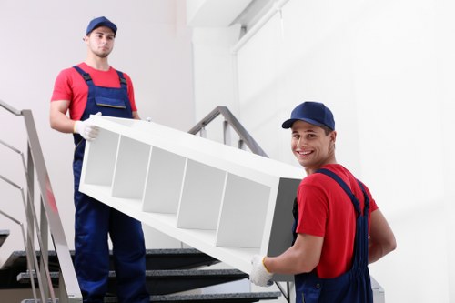 Local removals crew loading furniture for a move across Brent