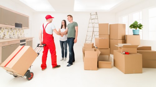 Packing and loading furniture into a moving truck for a Brent relocation