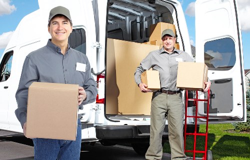 Brent removal van team handling household items